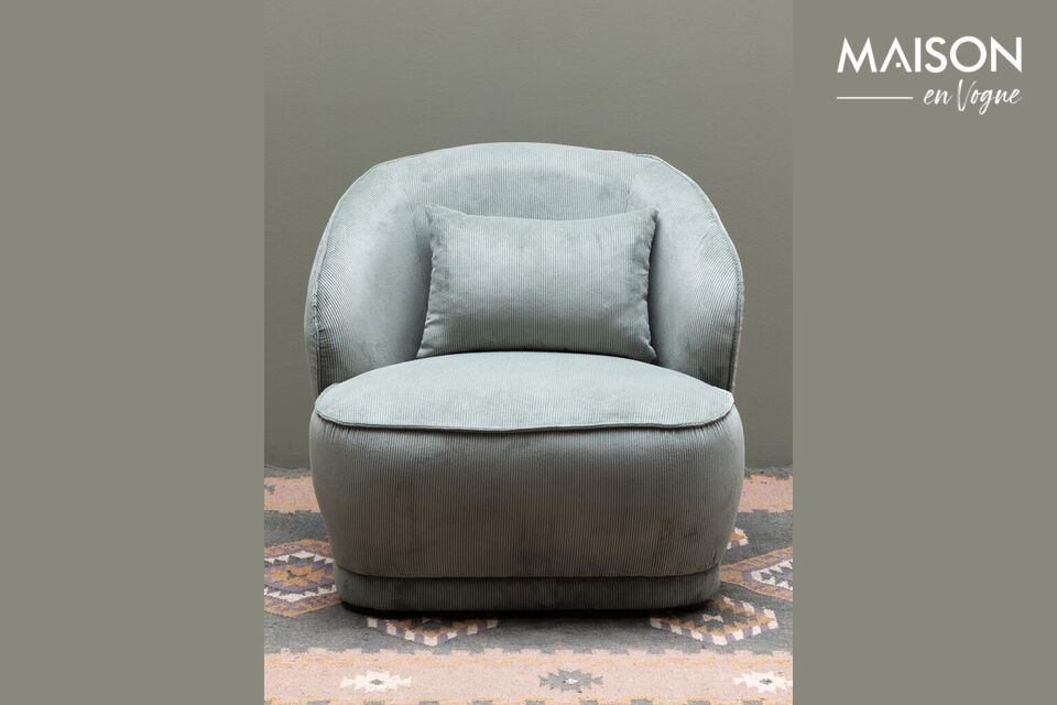 Un sillón verde que combina un estilo moderno con un confort duradero.